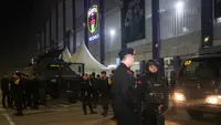 Sejumlah anggota kepolisian berjaga setelah laga lanjutan BRI Liga 1 2022/2023 antara Persita Tangerang melawan Persija Jakarta di Stadion Indomilk Arena, Tangerang, Selasa (28/03/2023). (Bola.com/Bagaskara Lazuardi)