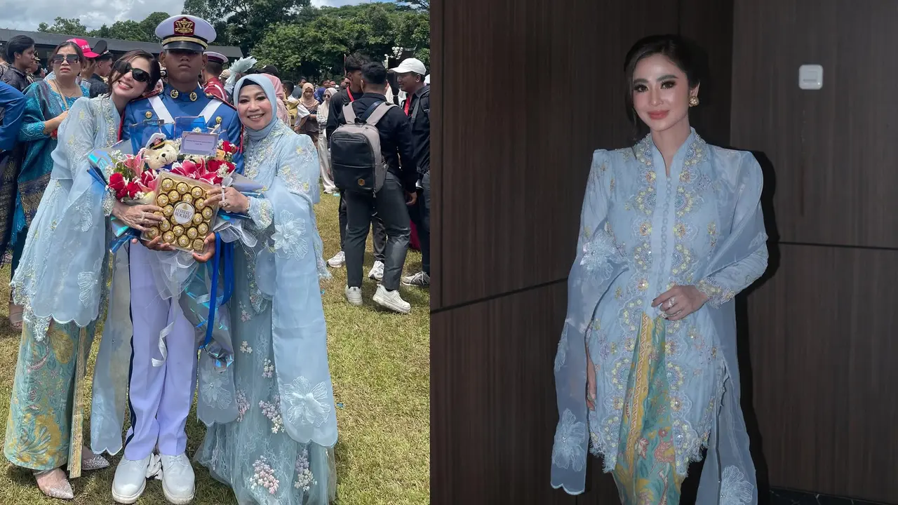 Potret Dewi Perssik dengan Kebaya Brokat Biru Muda