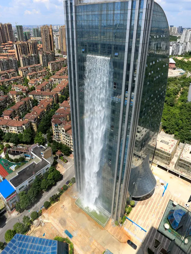 Air terjun dari gedung pencakar langit (foto: imaginechina)