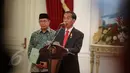 Presiden Joko Widodo saat memberikan Keterangan Pers terkait BPIH Tahun 2015 di Istana Merdeka, Jakarta, Rabu (27/5/2015). Penurunan ongkos haji tahun ini US$ 502 atau sekitar Rp 6,5 juta. (Liputan6.com/Faizal Fanani)