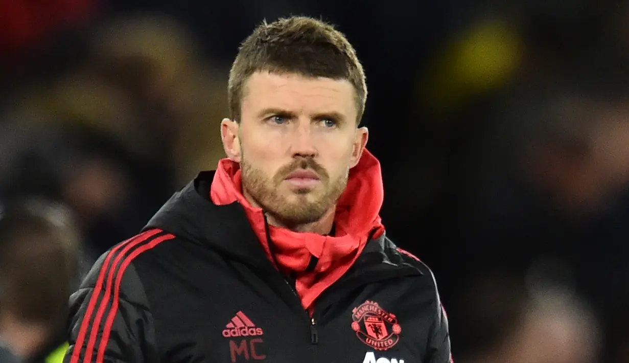 7. Michael Carrick - Berstatus sebagai staf pelatih di Manchester United membuatnya punya kans untuk mejadi pengganti Solskjaer. Kedekatan nya dengan para pemain bisa membuatnya diterima sebagai pelatih. (AFP/Glyn Kirk)
