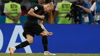 Domagoj Vida merayakan keberhasilannya membobol gawang Rusia pada laga perempat final Piala Dunia 2018. (AFP/Adrian Dennis)