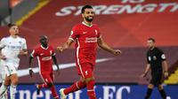 Striker Liverpool, Mohamed Salah mencetak hattrick saat timnya meladeni Leeds United. Liverpool menang 4-3 di Anfield, Sabtu (12/9/2020) WIB (Shaun Botterill / POOL / AFP)