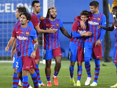 Barcelona sukses kalahkan Juventus pada pertandingan Joan Gamper Thropy meski tanpa sang bintang, Lionel Messi. Mereka tampil kompak dan berhasil melakukan serangan secara konsisten hingga mengurung pertahanan Juventus. (Foto: AFP/Pau Barrena)