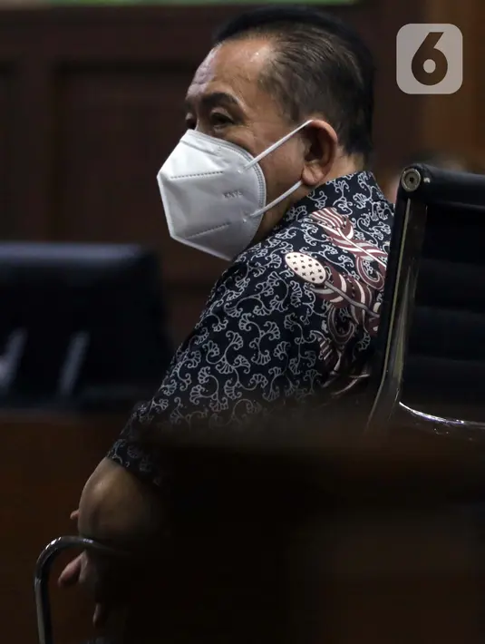 Terdakwa suap pengurusan fatwa MA serta penghapusan nama terpidana pengalihan hak tagih Bank Bali dari daftar red notice Polri, Djoko S Tjandra saat menjalani sidang tuntutan di Pengadilan Tipikor Jakarta, Kamis (4/3/2021). Djoko Tjandra dituntut 4 tahun penjara. (Liputan6.com/Helmi Fithriansyah)