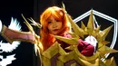 Seorang cosplayer berpose dalam acara League of Legends Mid-Season Invitational 2019 di GG Stadium, Ho Chi Minh, Vietnam  (7/5/2019). Turnamen e-sport ini digelar 1 hingga 19 Mei. (Reuters/Kham)