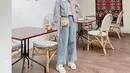 Style ala Korea identik dengan warna soft. Kombinasikan wide leg jeans warna blue jeans kamu dengan plaid blouse dengan aksen renda. Tambahkan topi sebagai pemanis. (Instagram/richaeu).