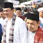 Pengunjung berselfie dengan Gubernur Basuki T Purnama saat Festival Palang Pintu 2016 di Jakarta, (28/5). Event tahunan tersebut diselenggarakan merayakan HUT ke-489 DKI Jakarta yang digelar pada 28-29 Mei 2016. (Liputan6.com/Immanuel Antonius)