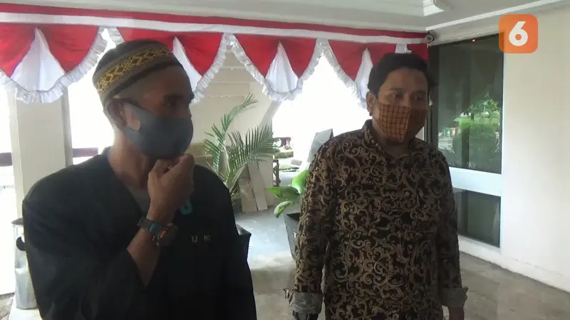 Ayah alm Qidam, Irwan Mowance bersama anggota TPM Sulteng, Andi Akbar