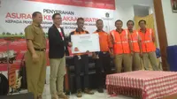 Ribuan Pegawai Harian Lepas Dinas Kebersihan DKI Jakarta menerima asuransi gratis (Liputan6.com/Ditto)