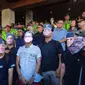 Topeng-topeng tokoh politik, menteri hingga calon gubernur, dipakai mahasiswa di Palembang saat menggelar demo tolak RUU Pilkada di depan kantor DPRD Sumsel (Liputan6.com / Nefri Inge)