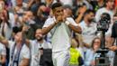 Pemain Real Madrid, Rodrygo melakukan selebrasi usai mencetak gol tendangan penalti pada pertandingan sepak bola La Liga melawan FC Barcelona di Madrid, Spanyol, Minggu (16/10/2022). Real Madrid unggul sejak menit ke-12 lewat sontekan Karim Benzema usai memanfaatkan bola muntah hasil tembakan Vinicius Junior yang sempat diblok kiper Barcelona. (AP Photo/Bernat Armangue)
