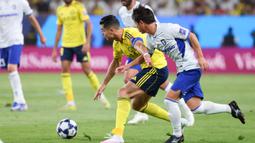 Kekalahan tersebut membuat Cristiano Ronaldo masih belum mampu mempersembahkan gelar kontinental untuk Al Nassr. Padahal, tim asuhan Jorge Jesus tampil dengan kekuatan terbaik sejak menit awal pertandingan. (AFP/Fayez Nureldine)