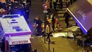 Petugas berusaha menyelamatkan korban dari aksi penembakan dan bom bunuh diri yang dilakukan teroris di Paris, Perancis, Jumat (13/11/2015). Dikabarkan ada 140 orang tewas dalam aksi teroris tersebut. (Reuters)