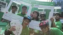 Sejumlah mitra dari Grab ikut meramaikan pawai obor Asian Games XVIII di Palembang, Sumatra Selatan, Sabtu (4/8/2018). Sebanyak 53 kota di Indonesia akan dilalui oleh obor Asian Games. (Bola.com/Reza Bachtiar)