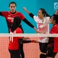 Pemain Voli Indonesia melakukan selebrasi saat melawan Thailand dalam babak penyisihan grup A voli putri Asian Games 2018 di lapangan Tennis Indoor Senayan, Jakarta, Senin (27/8). Indonesia kalah 1-3 dari Thailand. (Bola.com/Vitalis Yogi Trisna)