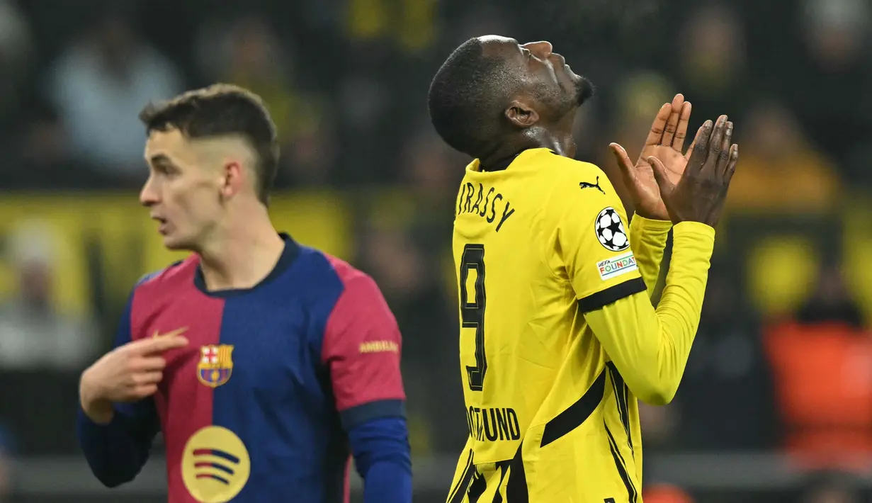 Borussia Dortmund berhasil menyamakan kedudukan lewat gol dari titik putih yang dicetak Serhou Guirassy pada menit ke-60. (INA FASSBENDER/AFP)