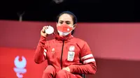 Atlet para-angkat berat Indonesia, Ni Nengah Widiasih, meraih medali perak para Paralimpiade Tokyo 2020, Kamis (26/8/2021). (Dok NPC Indonesia)