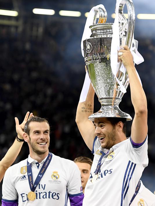 Pada musim lalu, pemain bernomor punggung 21 ini berhasil mencetak 15 gol dan membawa Real Madrid menjuarai La Liga dan Liga Champions. (EPA/Andy Rain)