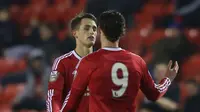 Ekspresi Adnan Januzaj (kiri) usai mencetak gol bagi Manchester United U-21, pada pertandingan kontra Southampton U-21, di Stadion Leigh Sports Village. Januzaj menuai dua gol, dan membawa timnya unggul 4-0. (manutd.com)