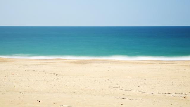 Ilustrasi pasir laut (Foto: Unsplash/Lopez Robin)