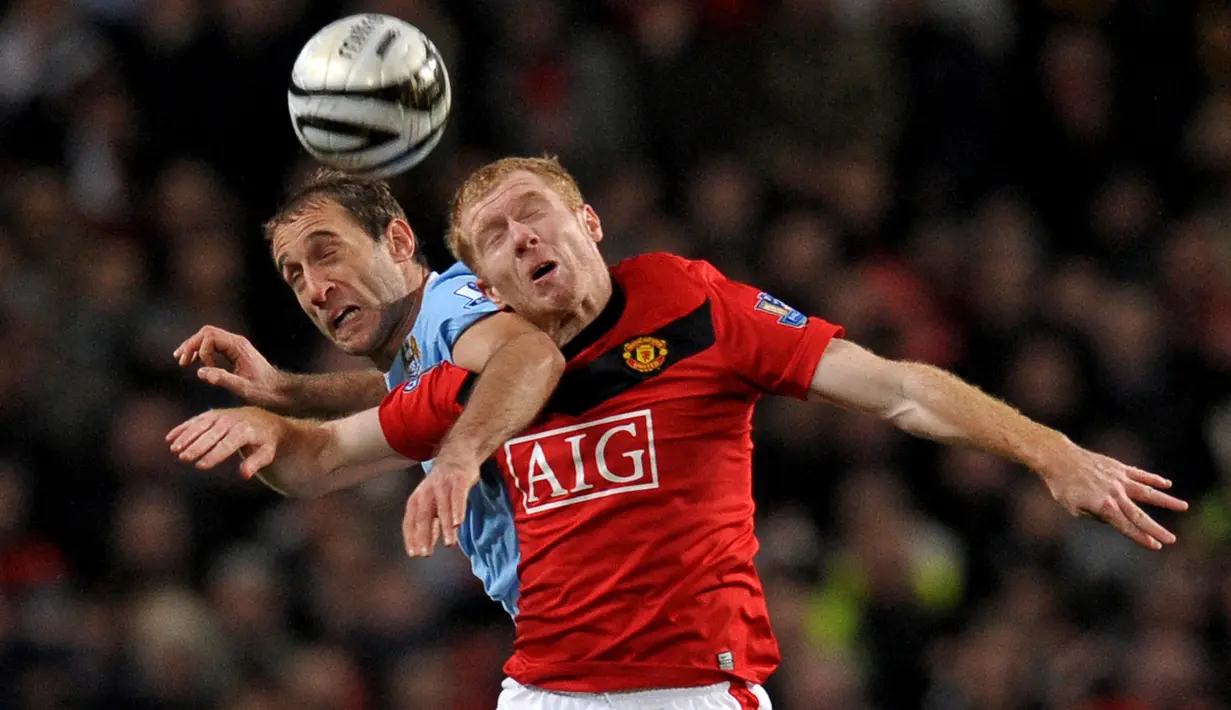 Paul Scholes. Telah memperkuat Manchester United dalam 718 pertandingan mulai musim 1993/1994 hingga 2012/2013 dengan 155 gol dan 73 assist. Meraih 11 trofi Liga Inggris, 2 Piala Liga, 3 Piala FA, 5 Community Shield, 2 Liga Champions, 1 Piala Toyota dan 1 PD antar-klub. (AFP/Paul Ellis)