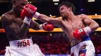 Manny Pacquiao kalah dari Yordenis Ugas pada pertandingan memperebutkan sabuk juara welter versi WBA di Las Vegas, Minggu (22/8/2021) (AP Photo/John Locher)