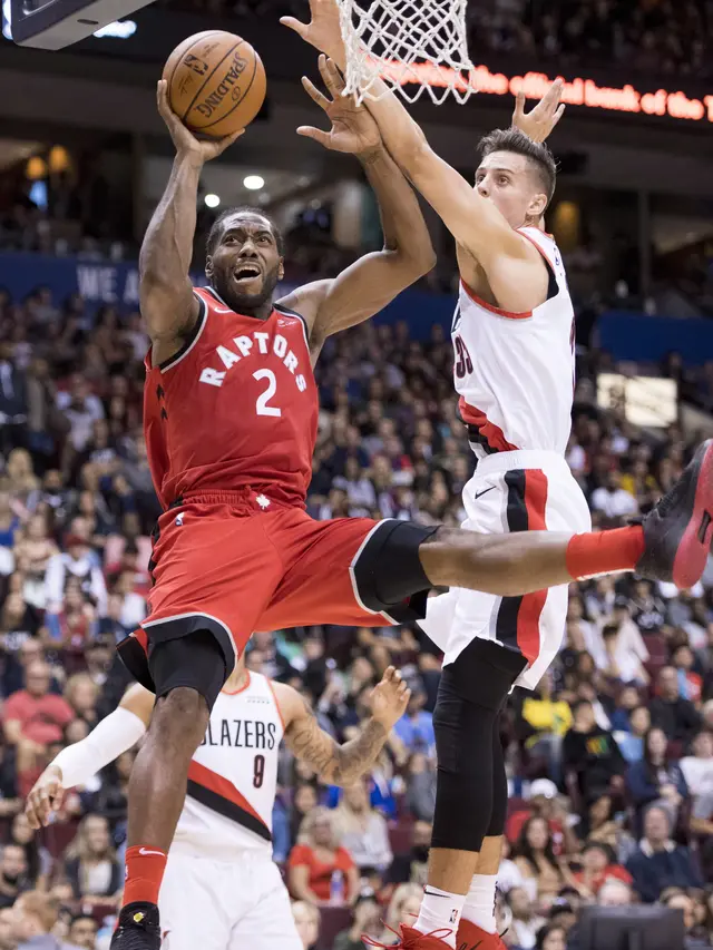 Kawhi Leonard melakoni debut bersama Toronto Raptors