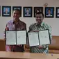 Kepala Badan Geologi Kementerian Energi dan Sumber Daya Mineral (ESDM) Rudy Suhendar dan Ketua Badan Informasi Geospasial (BIG) Hasanudin Z. Abidin.