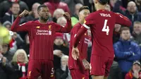 Gelandang Liverpool Georginio Wijnaldum bersama Virgil van Dijk merayakan golnya ke gawang West Ham United pada pekan ke-27 Liga Inggris di Anfield, Selasa (25/2/2020) dini hari WIB. (AP Photo/Jon Super)