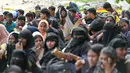 Sebanyak 219 imigran Rohingya kembali mendarat di pesisir Aceh. (CHAIDEER MAHYUDDIN / AFP)