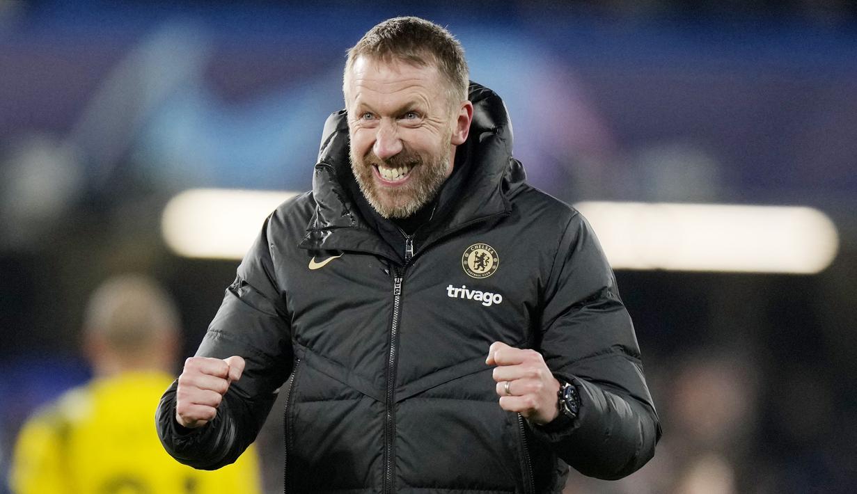 Ekspresi kebahagiaan pelatih Chelsea, Graham Potter, setelah menaklukkan Borussia Dortmund pada leg kedua 16 besar Liga Champions di Stadion Stamford Bridge, Rabu (8/3/2023). (AP Photo/Alastair Grant)