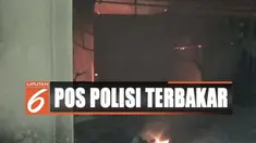 Selain menghanguskan pos polisi, api juga membakar belasan sepeda motor dan dua unit mobil polisi.
