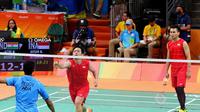 Ganda putra Indonesia, Mohammad Ahsan/Hendra Setiawan, berhasil menundukkan pasangan India, Manu Attri/Reddy B. Sumeeth, pada laga pertama penyisihan grup bulutangkis di Olimpiade Rio 2016, Kamis (11/8/2016) waktu Brasil. (CdM Olimpiade)