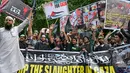 Aktivis Konferensi Nasional Pemuda Kashmir meneriakkan slogan anti-Israel dalam demonstrasi menentang operasi militer Israel di Gaza, di Srinagar pada tanggal 16 Juli 2014 (AFP PHOTO / Tauseef MUSTAFA)