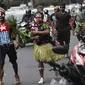 Mahasiswa Papua yang tergabung dalam Aliansi Mahasiswa Anti Rasisme, Kapitalisme, Kolonialisme, dan Militerisme berunjuk rasa di depan Istana Merdeka, Jakarta, Rabu (28/8/2019). Sejumlah mahasiswa terlihat melukis tubuh mereka dengan bendera Bintang Kejora. (Liputan6.com/Angga Yuniar)