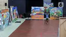 Mural merupakan sebuah cara atau pengecatan yang mengandung karya seni yang biasa di aplikasikan pada media dinding dan plafon atau pada permukaan yang bersifat permanen lainnya. (Liputan6.com/Herman Zakharia)