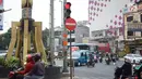 Penampakan lampu merah persimpangan Ramanda, Depok, Jawa Barat, Rabu (14/8/2019). Pemutaran lagu Wali Kota Depok Mohammad Idris di lampu merah tersebut sebagai bagian dari konsep Joyful Traffic Management (Jotram). (Liputan6.com/Immanuel Antonius)