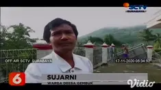 Tebing yang berada di lereng gunung Godongan, Pacitan, Jawa Timur mengalami longsor dan menimbun sebuah mobil truk pada Minggu sore (15/11).