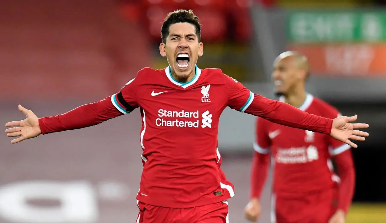 Rekan Salah di Liverpool, Roberto Firmino telah terlebih dahulu mencetak hattrick untuk The Reds saat mengalahkan Watford 5-0 pada pekan kedelapan (16/10/2021) Liga Inggris 2021/2022. Hal tersebut merupakan hattrick kedua Firmino selama kariernya di Liga Inggris. (AFP/Peter Powel)