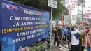 Suasana pelaksanaan Hari Bebas Kendaraan Bermotor atau Car Free Day (CFD) di sekitar jalan Margonda Raya, Depok, Jawa Barat, Minggu (4/5/2025). (Liputan6.com/Herman Zakharia)