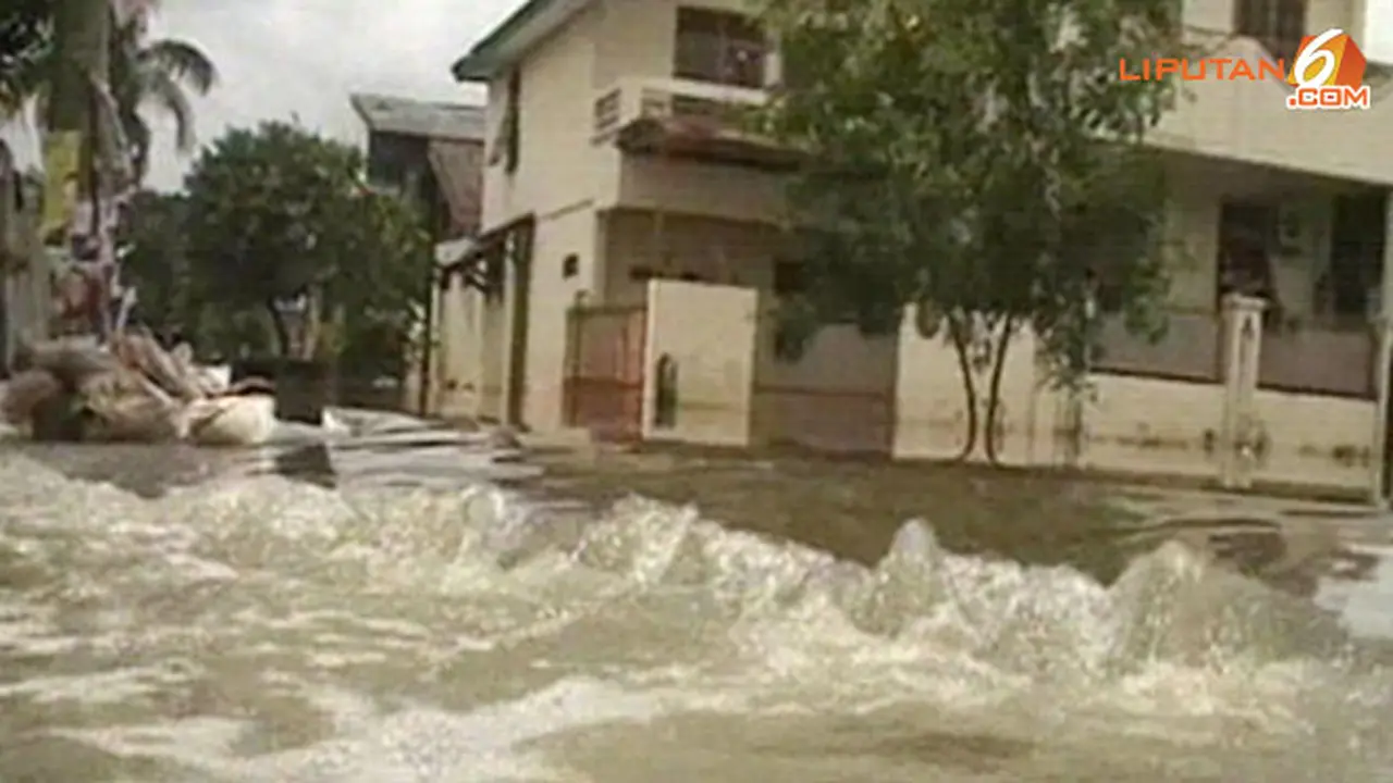 banjir-melanda-140225d.jpg