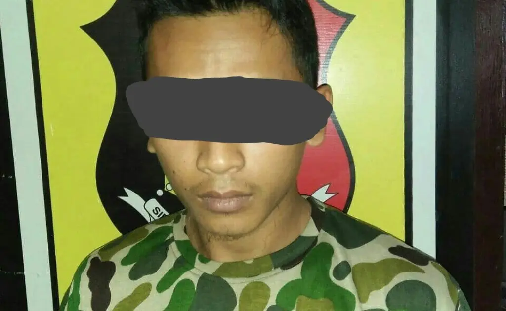 Dede (25) tersangka Marinir Gadungan. (Foto: Liputan6.com/Kodim Cilacap/Muhamad Ridlo)