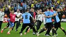 Di babak adu penalti, Uruguay unggul 4-2 atas Brasil. Kemenangan ini mengantar La Celeste melaju ke semifinal Copa America 2024. (Robyn Beck/AFP)