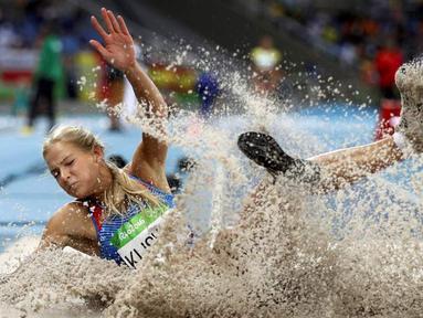 Darya Igorevna Klishina adalah atlet lompat jauh Rusia. Sebagai juara Universiade 2013, Darya Klishina bisa tampil di Olimpiade Rio 2016, namun hanya berada di peringkat ke-9. (Reuters/Phil Noble)