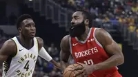 Aksi Bintang Rockets James Harden berduel dengan Victor Oladipo pada lanjutan NBA (AP)