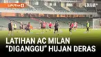 Sesi latihan terbuka AC Milan digelar di Hong Kong Stadium diganggu hujan deras. Latihan dilakukan jelang pertandingan melawan Liverpool.