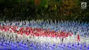 Atlet kontingen Indonesia memasuki stadion pada pembukaan Asian Games 2018 di Stadion Utama Gelora Bung Karno (SUGBK), Jakarta, Sabtu (18/8). Kontingen Indonesia mendapat sambutan meriah penonton yang hadir. (Liputan6.com/Ferbian Pradolo)