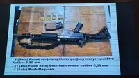 Penampakan senjata laras panjang yang digunakan Kopda Basarsyah menembak mati 3 polisi saat lokasi judi sabung ayamnya digerebek. Foto : (Liputan6.com/Ardi).