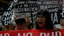 Aksi ini dikenang sebagai perlawanan damai dengan demonstrasi jalanan yang dilakukan rakyat Filipina di Epifanio de los Santos Avenue (EDSA). (JAM STA ROSA/AFP)
